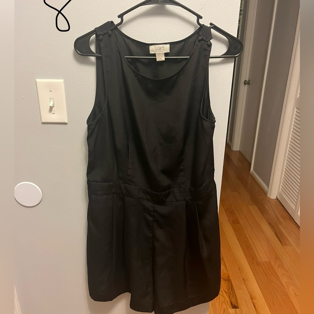 ROMPER. Good condition. Moderately worn. Side zipper. Shoulder buttons